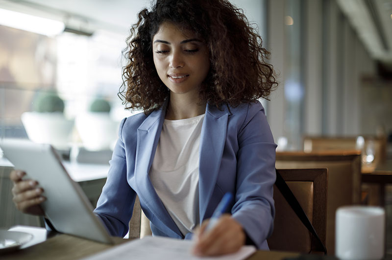Businesswoman working at a cafe