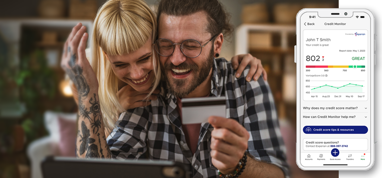 A happy couple celebrate after checking their credit score